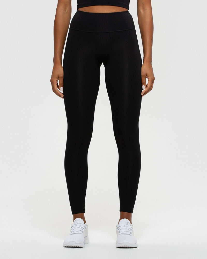 Buy Topshop women solid pull on leggings black Online