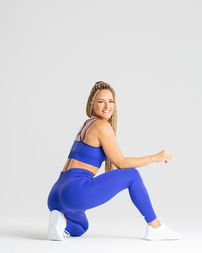 Solid Royal Blue Crossover Waist Leggings With Pockets – Sunia Yoga
